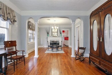 Double parlor entry way and dining room with funct