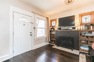 BRICK FIREPLACE WITH BUILT IN SHELVING