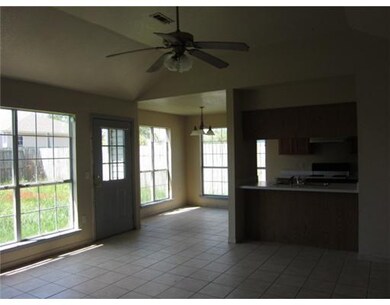 Living Room. tile in living room and dining area,