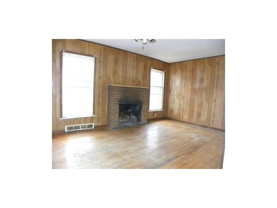 Terrific fireplace is a great focal point for this