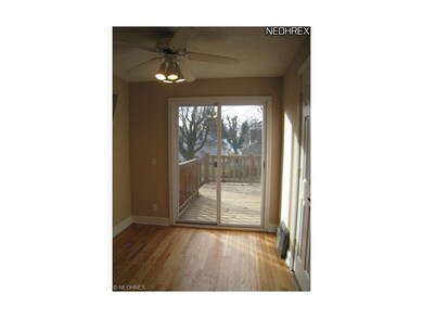 Dinette with hardwood floors.