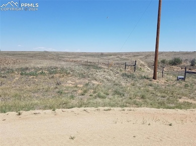 View of yard with a rural view