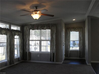 Front door entrance with a coat closet across from