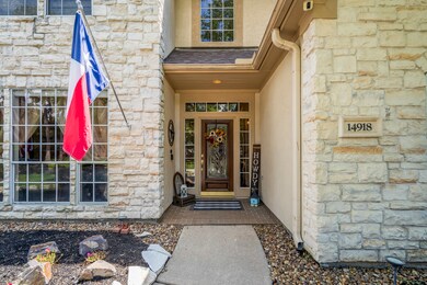 Covered front porch is an inviting space to welcome friends and family!