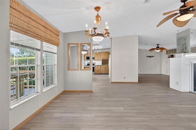 Dining Room & Kitchen Nook looking into Kitchen and Family Room