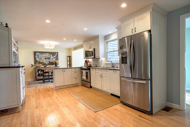 Kitchen with hardwood floors. 11 x 17 feet