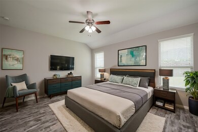 Very spacious primary bedroom.