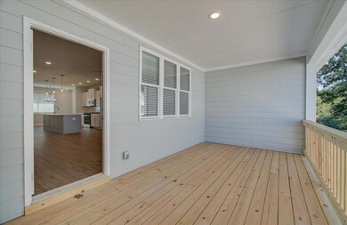 Imagine the gatherings on this large covered deck. It's ready to mount your big screen TV and watch sports while hosting your friends at your new home.
