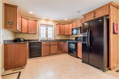 Cherry kitchen with granite countertops