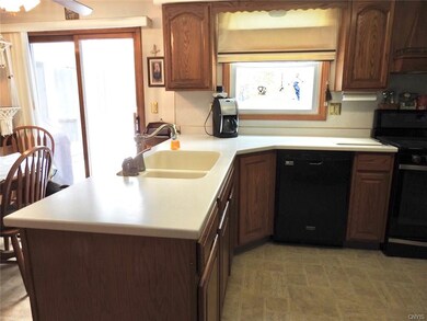 Kitchen with solid surface counter tops.