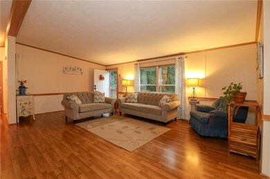 THE LIVING ROOM IS LARGE AND OPEN AND CAN BE ARRAN