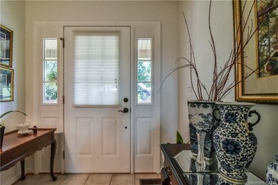 Inviting Front Entry With Ceramic Tile.