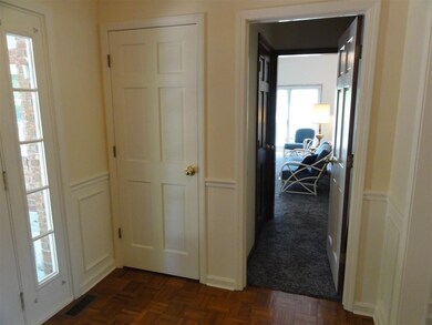 In this connecting hallway is the door to the full
