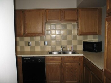 Kitchen with back splash.