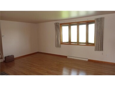 Living Room. Neutral decor will match any colors.