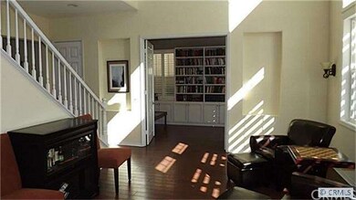 Another view of the living room looking into the o
