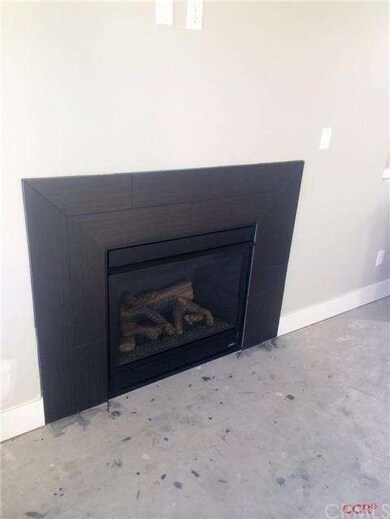Gas insert fireplace with upgraded tile surround a