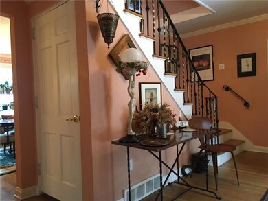 Entrance hall allows access to a large coat closet