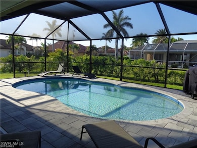 Pool featuring a residential view, a lanai, and a