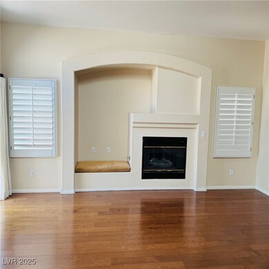 Unfurnished living room with wood finished floors,
