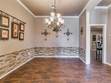 Updated formal dining room.  Home has wood-look po