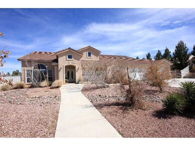 Facade/Exterior Front. Custom one-story home on ap
