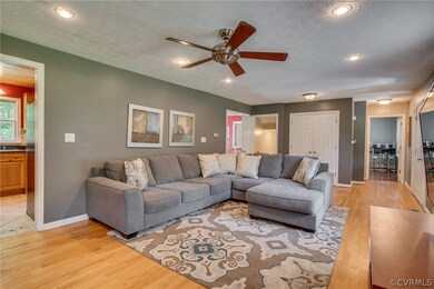Recessed lighting and access to dining area/kitche