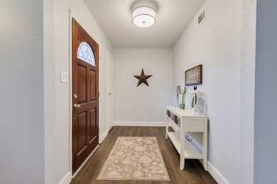 Nice Entryway with convenient closet by the door,