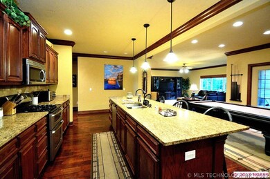 Gorgeous hardwood floors extend from the entry to