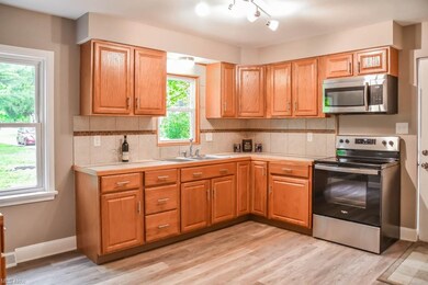 Neutral kitchen with brand new, stainless steel ap