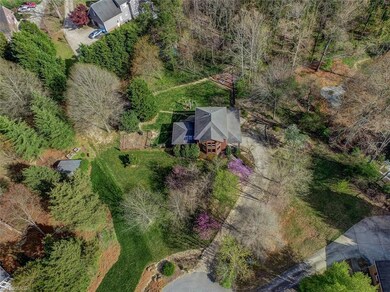 The lot from above with mature trees