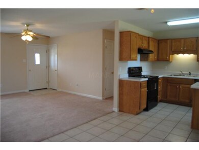 View of Kitchen - Opening up into the Living Room 