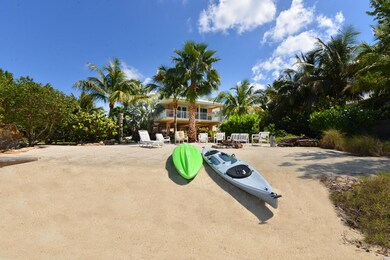 Sandy Beach & Tranquil Water Views