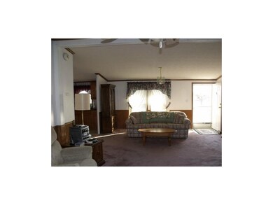 Standing by sliding door looking at living room. N