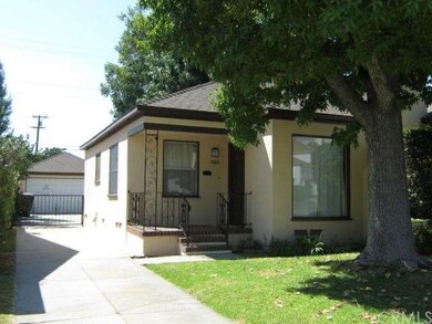 Front view with view of 2 car garage with remote