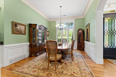 The formal dining room is the epitome of refined e