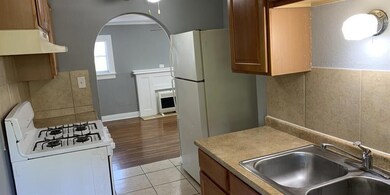 Kitchen featuring light hardwood / wood-style floo