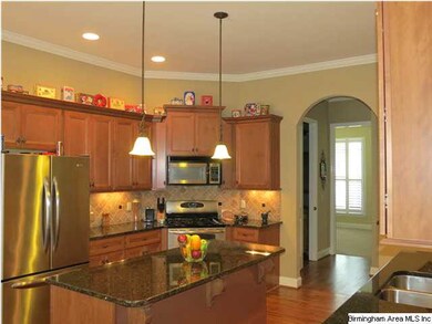 Gleaming kitchen cabinets that look like fine furn