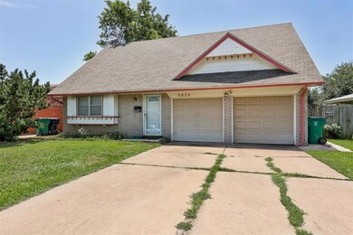 View of front of home featuring a garage and a fro