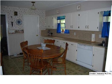 spacious kitchen with vinyl floors, new tile count