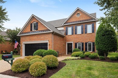View of front of property with a garage and a fron