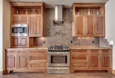 Custom built Knotty Cherry Cabinets