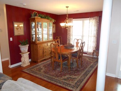 This open concept features a formal dining area just off the living room