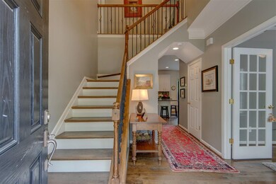 Front door opens to an inviting foyer with sand an