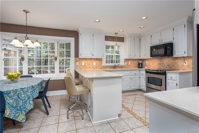 Bright eat-in kitchen with big bay window.
