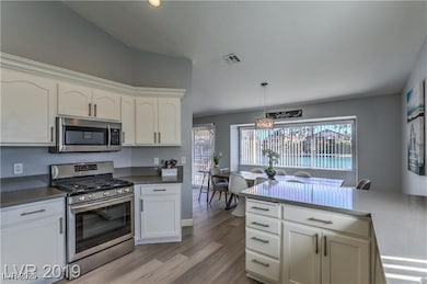 Kitchen featuring appliances with stainless steel