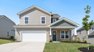Front Exterior of The Cameron Design by DRB Homes
