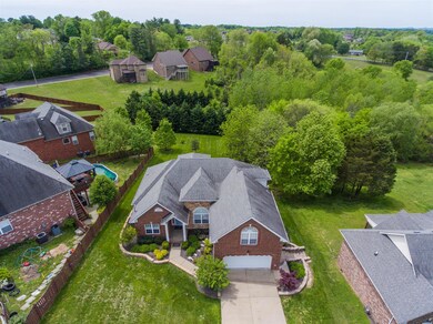 The home has an extra large lot for the neighborhood and backs up to a line of trees