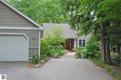 The detached garage and front of home.