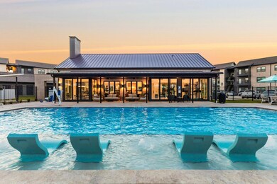 View of pool at dusk